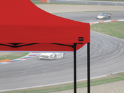10x10 pop up tent set up as a racing canopy at a trackside event